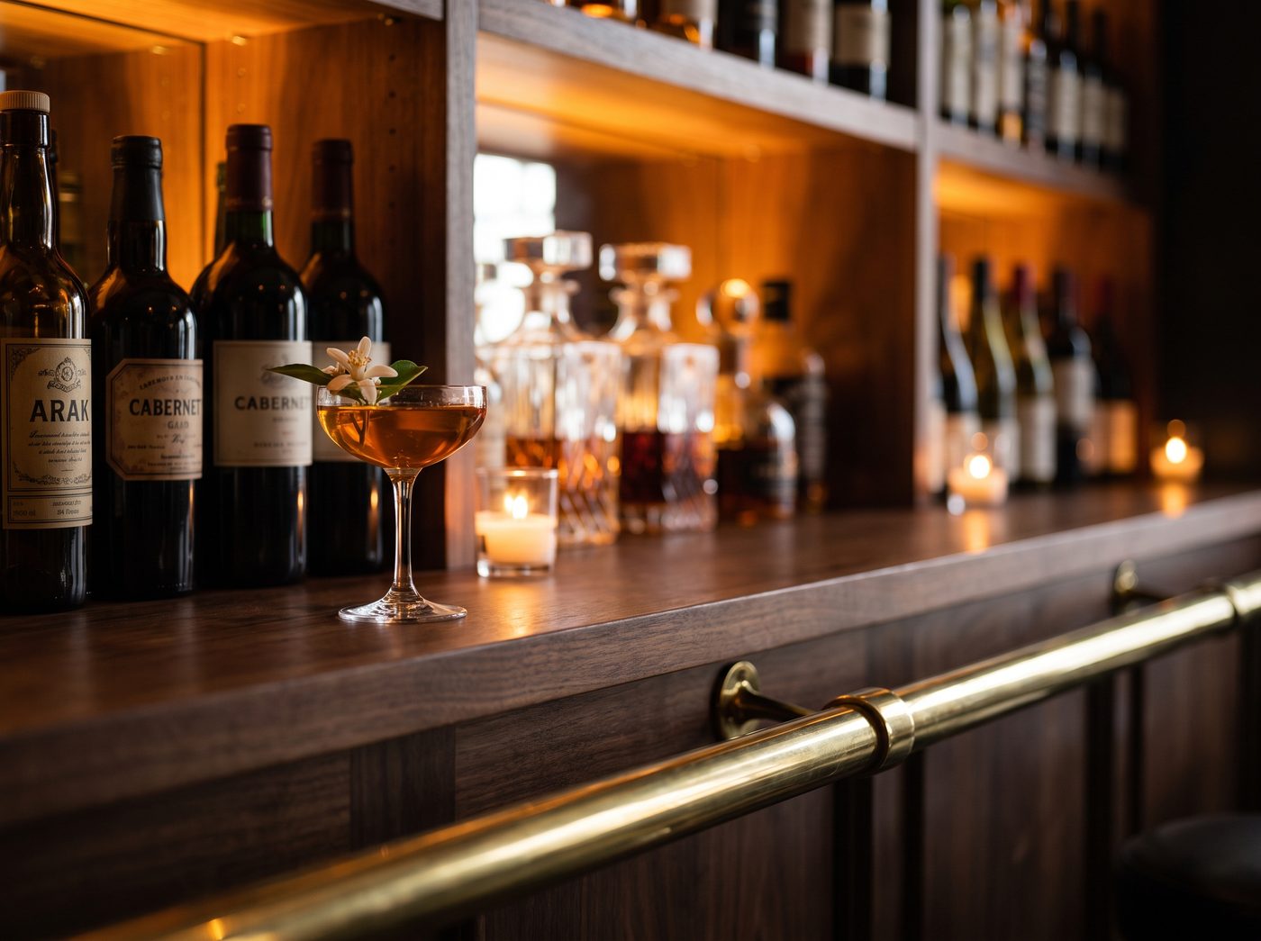 Brass, walnut and firelight — details of the bar